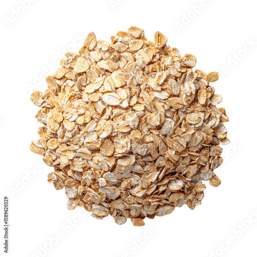Oatmeal flakes: An overhead view of uncooked oatmeal flakes, their light tan color forming a nutritious and versatile base for breakfast.