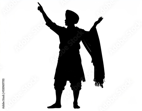 Silhouetted person in traditional attire