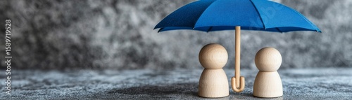 Blue Umbrella Protecting Wooden Figures, Safety, Security, Protection