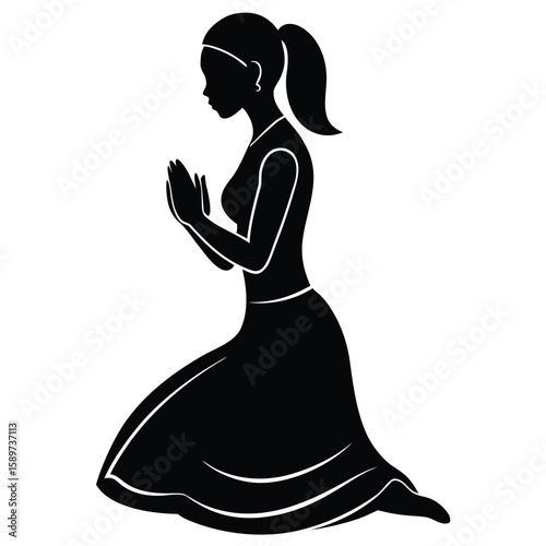 Woman praying in silhouette black kneeling
