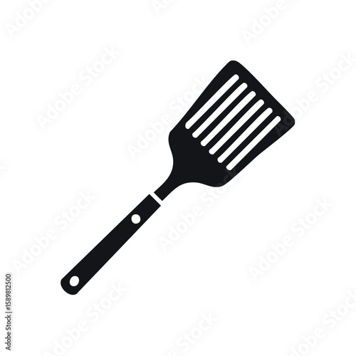 Black silhouette of a slotted turner for cooking and grilling. Simple kitchen utensil icon. Kitchenware symbol isolated.