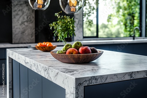 Modern Kitchen With Marble Countertop Featuring Fresh Fruits and Greenery Dur...