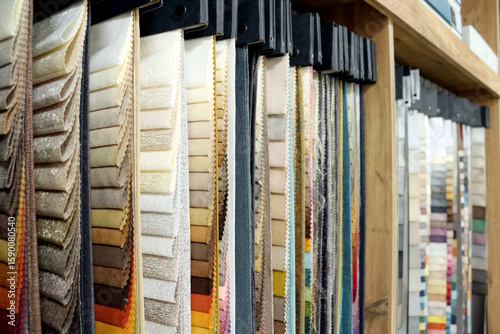 curtain sample folders hanging on a rail