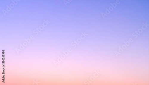 桃色から水色へ続く朝の空