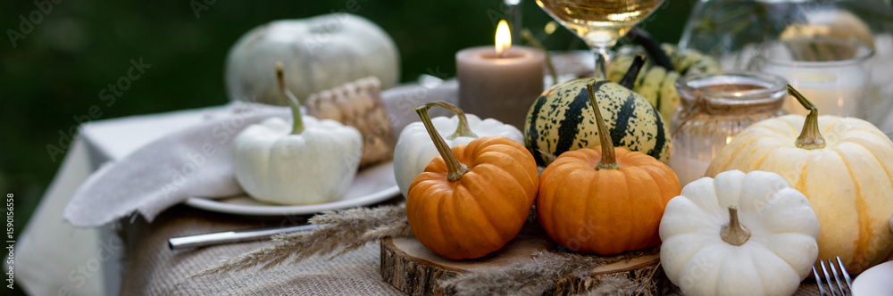 Fotografie Simple craft elements, pumpkins as decoration, candles