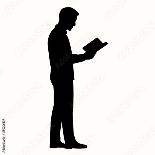 Silhouette of a Man Reading a Book