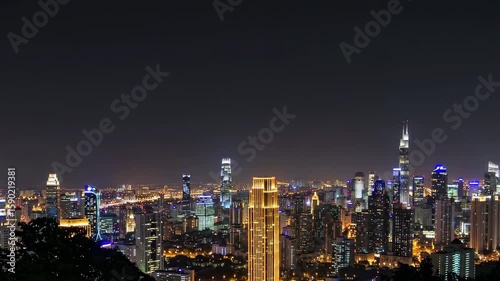 Wallpaper Mural Vibrant cityscape at nighttime with dynamic skyline illumination and twinkling skyscrapers Torontodigital.ca
