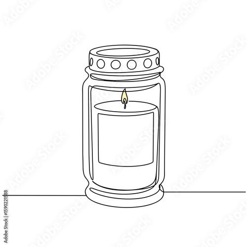 Decorative candle in glass jar with flame on simple background  