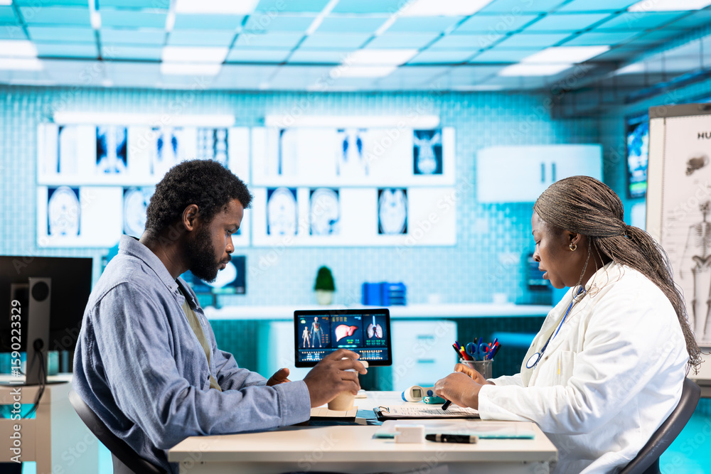 Obraz premium Female specialist discussing health care concerns with a male patient, incorporating technology, diagnostics and medical communication for better outcomes. Ensuring wellness with expertise.