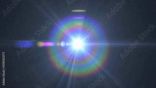 A bright central light source surrounded by a rainbowlike halo with linear light rays extending outward
