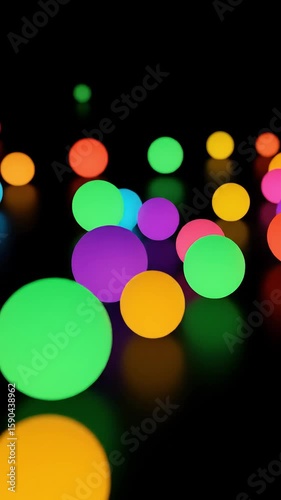 Vibrant Floating Spheres with Neon Illumination on Black Surface Creating Dynamic Colorful Abstract Scene