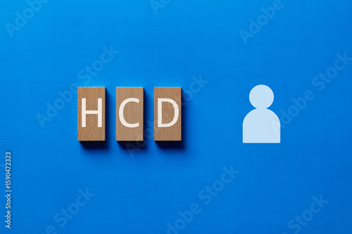 HCD (Human Centered Design) wooden block. Ideal for Business and Technology, perfect for articles on user experience (UX), prototyping, and product development.