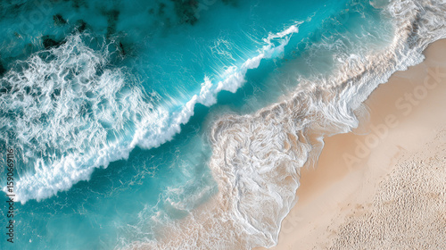 Aerial View of Turquoise Ocean Waves Crashing on a White Sand Beach