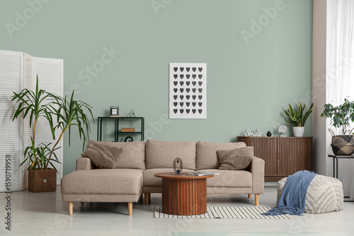 Comfortable sofa, table and...