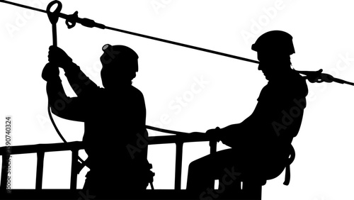 Silhouettes of two people on a zipline platform preparing to descend on the zipline adventure course