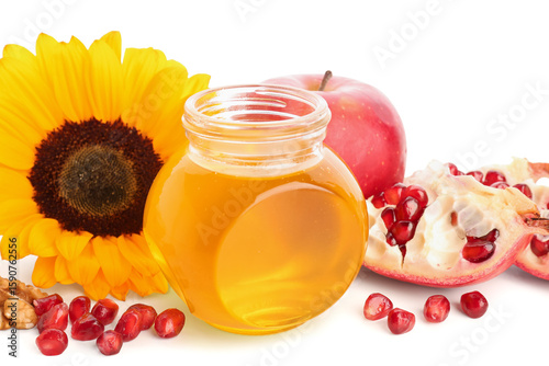 Jar of honey with pomegrana...