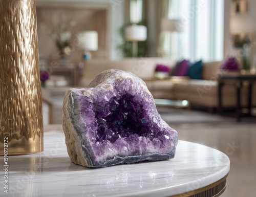 Purple amethyst geode on a marble surface.