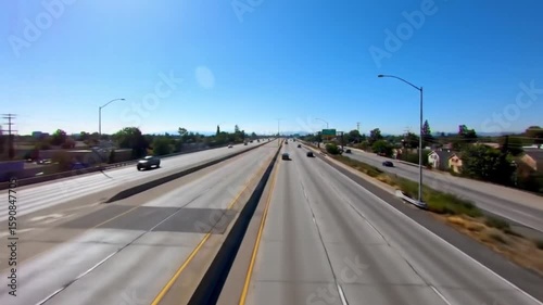 Vast Highway Under Azure Sky A Journey Through Transportation Infrastructure and Clear Horizon Views