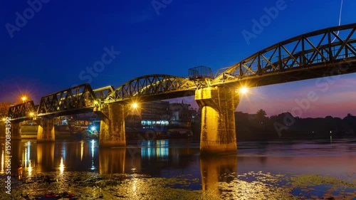 Timelapse of Bridge River Kwai at Kanchanaburi, Thailand in sunrise time. Is a famous place and a tourist destination