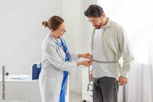 Young man with nutritionist...