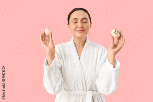Smiling young woman with ba...