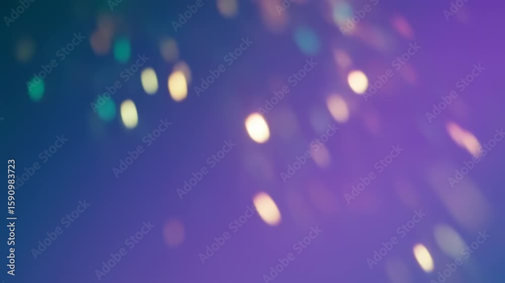 Abstract purple and blue bokeh background with sparkling light leaks suitable for festive events
