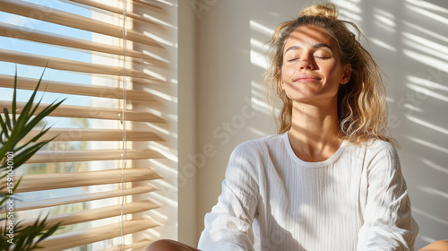 Calm face illuminated by diffused light, enjoying moment of tranquility and breathwork Free Download Calm face illuminated by diffused light, enjoying moment of tranquility and breathwork - GFXLoad