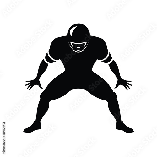 Dynamic football player in defensive stance ready for action with knees bent