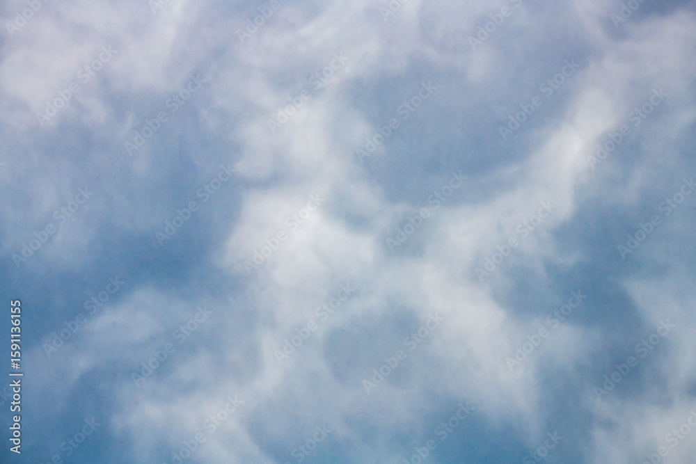 Fototapeta premium Cloud patterns in the cloud covered sky