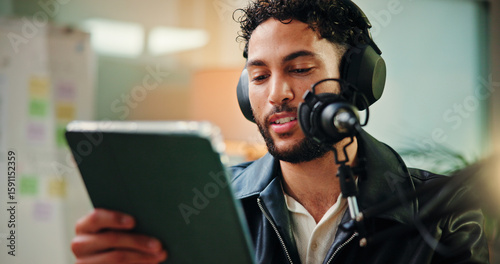 Fotografía Creative, influencer and man with mic, tablet and read script for episode, content creation and app