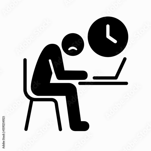 Solid black person at desk with clock icon representing overwork