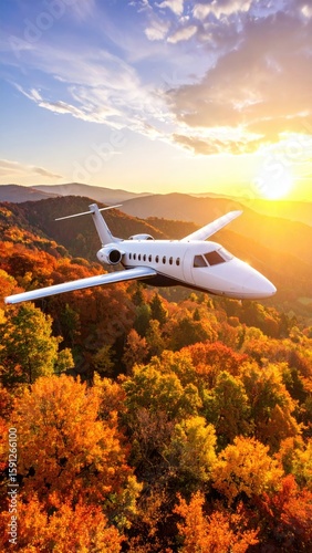 Private jet over autumnal mountains
