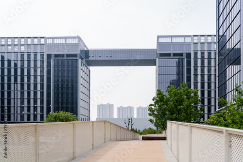 Modern commercial buildings are set in green and environmentally friendly green landscapes, with the appearance of commercial and office buildings and urban modern architectural structures