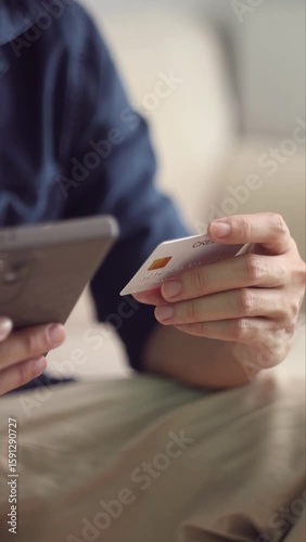 Man using credit card. Male making online payment. Manentering credit card info.