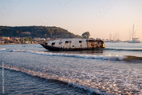 Rusty Shipwreck on a Tranquil Beach