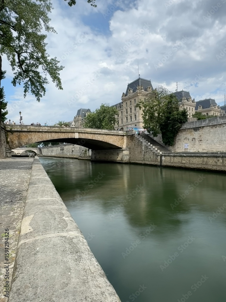 Naklejka premium View from walkway along bank of the River Seine in Paris, France.