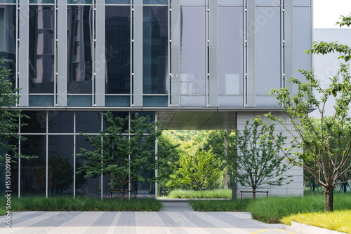 Modern commercial buildings are set in green and environmentally friendly green landscapes, with the appearance of commercial and office buildings and urban modern architectural structures
