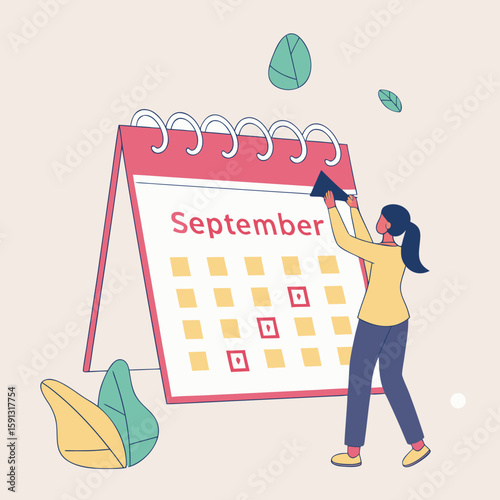 Woman places a dark blue square on a september calendar with leaves floating around in a light setting