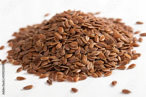 Brown Flaxseeds Pile on White Studio Background