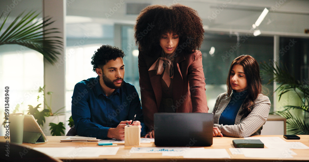 Obraz premium Coaching, feedback and laptop with business people in office for education or training. Collaboration, computer and review with employee team at desk in workplace for project management or update