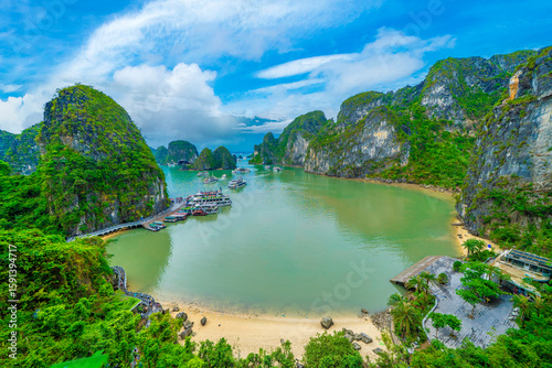 Foto Panorama view from the Sung Sot Cave, also known as Surprise Grotto, is indeed located on Bo Hon Island in Ha Long Bay with blue sky sunny day