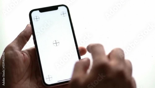 close-up shot of hand interact with white blank screen phone, isolated on white background