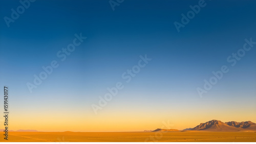 Clear desert sky
Desert twilight sky (16:9), an endless gradation from deep blue in the zenith to warm yellow on the horizon, completely clear and cloudless