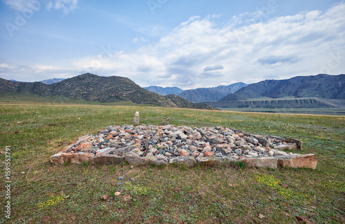 Ancient burials in the Altai mountains on terrace of the Katun and Bolshoy Yaloman rivers.