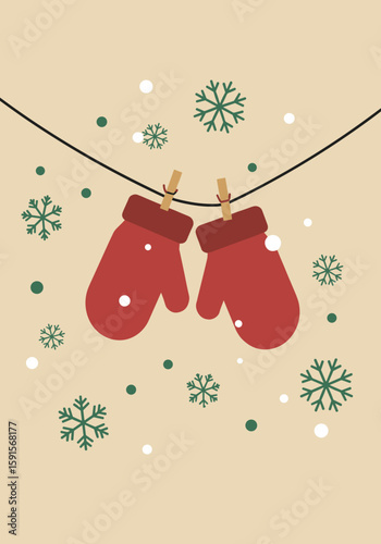 Red mittens hanging on a string with snowflakes on beige background  