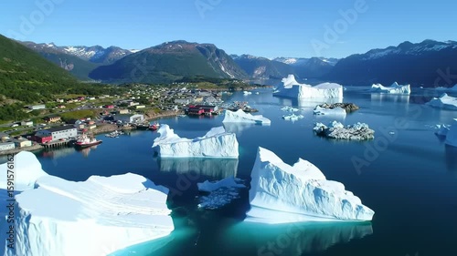 Icebergs near a coastal town