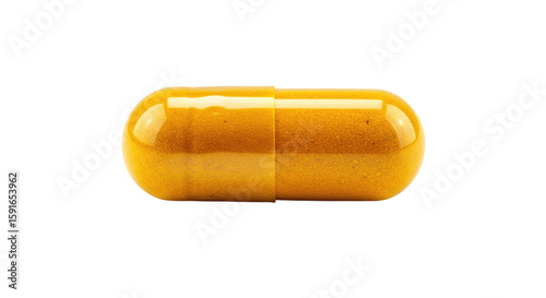 Single Golden Yellow Capsule Pill.