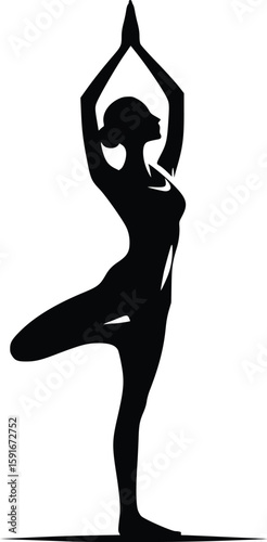 Silhouette of a woman performing a tree pose in yoga