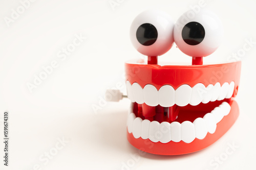 Billede på lærred Funny red teeth with eye toy denture model for dental health care