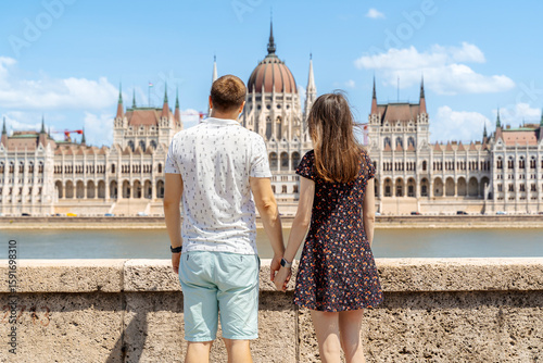 Photography Couple admiring Budapest Parliament from across the Danube